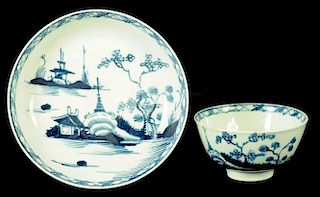 A LIVERPOOL TEA BOWL AND SAUCER, C1765-75  painted in underglaze blue with the Cannonball pattern,