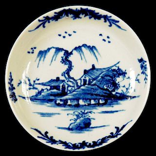 A DERBY SAUCER, C1770  painted in underglaze blue with a version of the Scroll Border Island