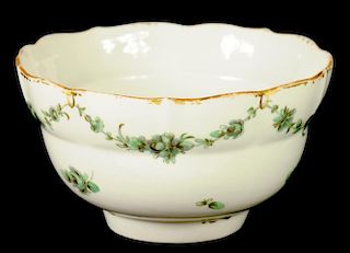 A BRISTOL OGEE SLOP BASIN, C1775-78 painted in green monochrome with swags, 14.5cm diam, blue enamel