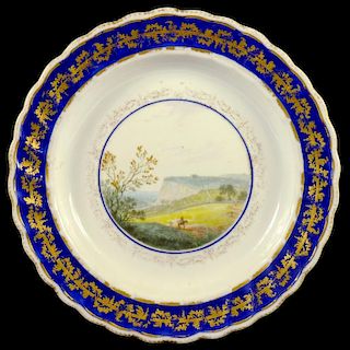 A DERBY PLATE PAINTED BY ZACHARIAH BOREMAN WITH A VIEW NEAR THE MANIFOLD STAFFORDSHIRE, C1790  21.