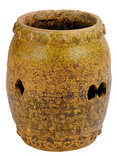 A CHINESE STONEWARE DRUM SHAPED JAR, YUAN/MING DYNASTY covered in a thin brown glaze, 12cm h (ex
