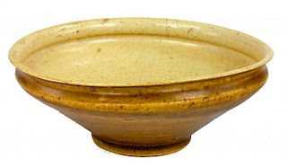 AN ANNAMESE BOWL, 13TH-14TH C  the crackled creamy glazed interior with five stilt marks, the