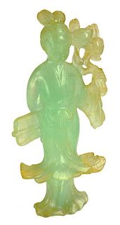 A CHINESE SEA GREEN FLUORSPAR CARVING OF A MAIDEN HOLDING A PEACH BOUGH, LATE 19TH/EARLY 20TH C 19cm