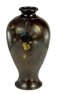 A JAPANESE BRONZE AND MIXED METALS BALUSTER VASE, MEIJI  finely carved and inlaid in shakudo,