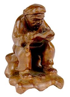 A JAPANESE CARVED WOOD FIGURE OF A MAN READING A BOOK, MEIJI  10cm h ++ In good condition