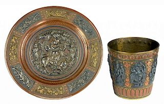 AN INDIAN BRASS BEAKER WITH COPPER AND SILVER APPLIED DECORATION AND A SIMILAR DISH, 19TH C