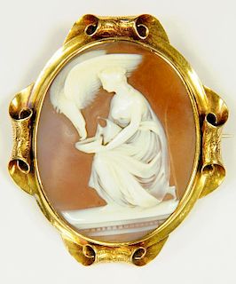 A VICTORIAN CAMEO BROOCH, THE OVAL SHELL CARVED WITH HEBE GOLD MOUNT, 14G GROSS