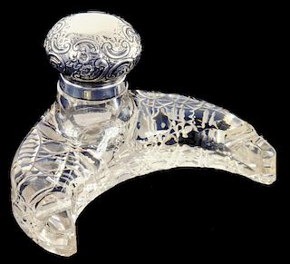 A VICTORIAN SILVER MOUNTED CRESCENT SHAPED CUT GLASS INKWELL, SHEFFIELD 1900
