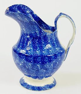A BLUE AND WHITE SPATTER WARE JUG, LATE 19TH C