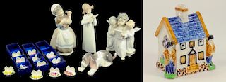 A LLADRO DOG, THREE OTHER SIMILAR FIGURES, THREE SETS OF FOUR AYNSLEY PLACE STANDS AND A YORKSHIRE
