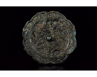 CHINESE TANG DYNASTY BRONZE MIRROR WITH ANIMALS