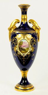 A COALPORT COBALT GROUND VASE, PAINTED WITH AN OVAL LANDSCAPE MEDALLION AND SMALLER PANEL TO THE