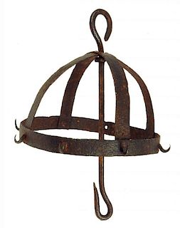 A VICTORIAN WROUGHT IRON CROWN SHAPED HANGING MEAT HOOK