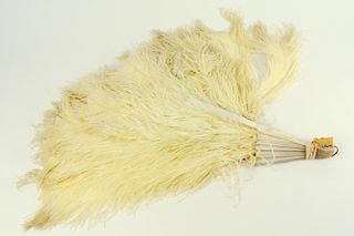 A 19TH CENTURY MOTHER OF PEARL AND OSTRICH FEATHER FAN (FAULTS)