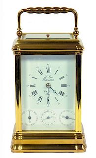 A FRENCH BRASS CARRIAGE CLOCK BY L'EPEE, WITH SUBSIDIARY DAY, DATE AND ALARM DIALS, IN GORGE CASE
