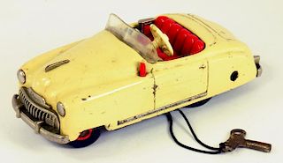 A SCHUCO RADIO 4012 TINPLATE SPORTS CAR, 1950'S