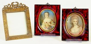 TWO SIMILAR FRENCH DECORATIVE OVAL PORTRAIT MINIATURES OF LADIES OF FASHION IN SIMULATED