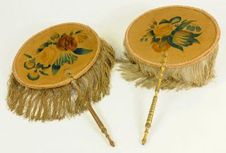 A PAIR OF EARLY VICTORIAN PAINTED FELT AND SILK OVAL HANDSCREENS, FRINGED GILTWOOD HANDLE