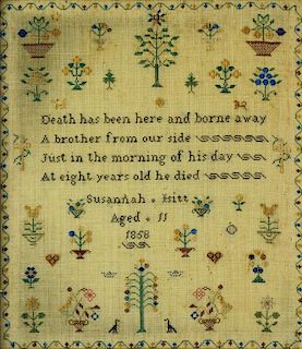 A LINEN SAMPLER WORKED BY SUSANNAH ISITT AGED ELEVEN 1858 WITH BIRDS, TREES AND FLOWERS, OAK FRAME