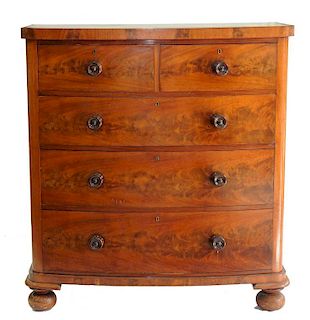 A VICTORIAN MAHOGANY BOW FRONTED CHEST OF DRAWERS