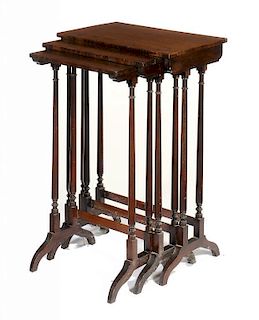 A REGENCY ROSEWOOD NEST OF THREE TABLES, C1820 73cm h; 30 x 48cm ++ Stretchers replaced but not