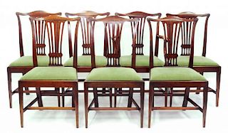 A SET OF SEVEN EDWARDIAN MAHOGANY DINING CHAIRS IN CHIPPENDALE STYLE WITH PIERCED SPLAT AND DROP