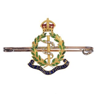 An early 20th century gold diamond and enamel Royal Army Medical Corps brooch. The rose-cut diamond