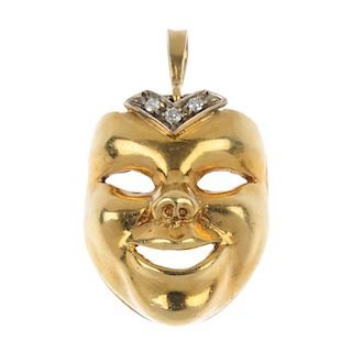 A diamond mask pendant. Designed as a smiling face, with single-cut diamond chevron highlight, suspe
