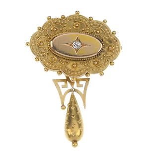 A late 19th century gold diamond brooch. The old-cut diamond oval panel, within a cannetille scallop
