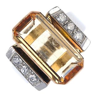 A topaz and diamond dress ring. The rectangular-shape golden topaz collet, to the brilliant-cut diam