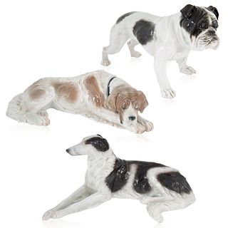 A GROUP OF THREE PORCELAIN DOG FIGURES