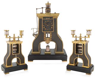 A THREE-PIECE INDUSTRIAL STEAM DESK CLOCK AND CANDELABRA, GUILMET, PARIS, CIRCA 1900