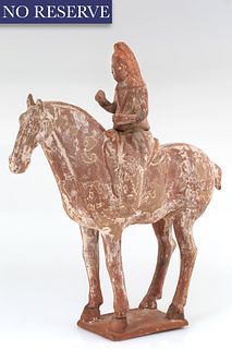 A CHINESE TERRACOTTA FIGURE OF A HORSE RIDER, TANG DYNASTY (618-907)