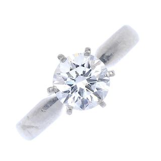 <p>A platinum diamond single-stone ring. The brilliant-cut diamond, to the plain band. Estimated dia