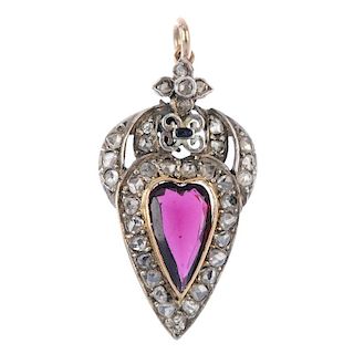 A garnet and diamond pendant. The heart-shape garnet, within a rose-cut diamond surround, to the blu