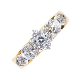 A mid 20th century 18ct gold diamond five-stone ring. The old-cut diamond, within an illusion settin