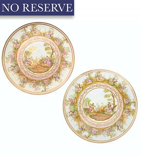 A PAIR OF GERMAN-AUSTRIAN PORCELAIN CHARGER PLATES, SCHUTZ CILLI (1854-1917), EARLY 20TH CENTURY