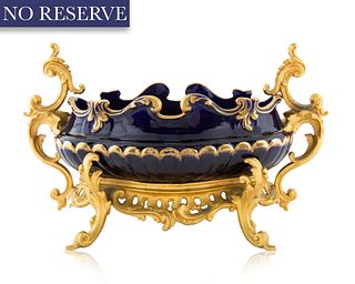 A FRENCH ORMOLU-MOUNTED PORCELAIN PLANTER, 19TH CENTURY 