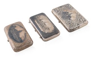 A SET OF THREE RUSSIAN SILVER AND NIELLO CIGARETTE CASES, VARIOUS WORKMASTERS, MOSCOW, 1870S-1890S