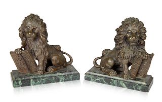 A PAIR OF FRENCH LION BRONZE AND GREEN MARBLE BOOKENDS, LATE 19TH CENTURY 