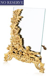 A SMALL TABLETOP GILT VANITY MIRROR, POSSIBLY BRADLEY & HUBBARD MANUFACTURING COMPANY, LATE 19TH-MID 20TH CENTURY 