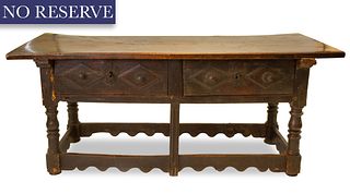 [ROERICH] AN ITALIAN OR POSSIBLY FRENCH CARVED WALNUT TABLE WITH DRAWERS, 16TH CENTURY 