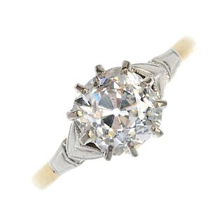 A diamond single-stone ring. The old-cut diamond, weighing 2.04cts, to the foliate shoulders and pla
