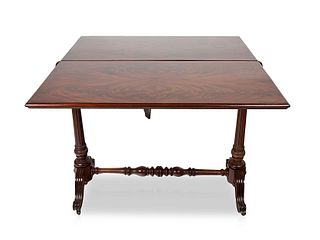 A WOODEN DINING TABLE, 19TH CENTURY 