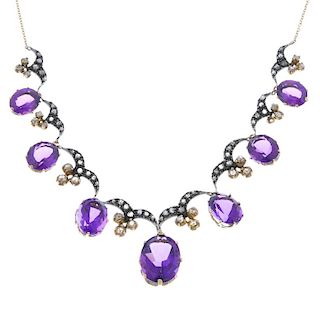 An amethyst and diamond necklace. The graduated oval-shape amethyst fringe, with similarly graduated