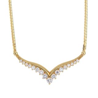 An 18ct gold diamond necklace. The graduated brilliant-cut diamond chevron, to the flattened curb-li