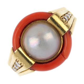 A mabe pearl, coral and diamond dress ring. The mabe pearl, within a coral surround, to the brillian