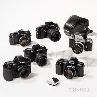 Six Nikon Cameras and Lenses