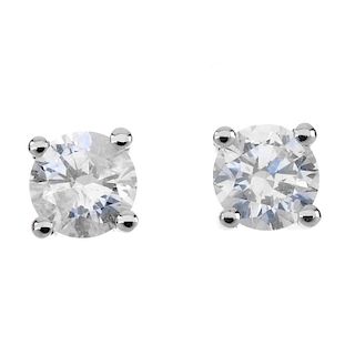 A pair of 18ct gold brilliant-cut diamond ear studs. Total diamond weight 0.50ct, stamped to mount,