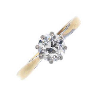 A diamond single-stone ring. The circular-cut diamond, to the tapered shoulders and plain band. Esti